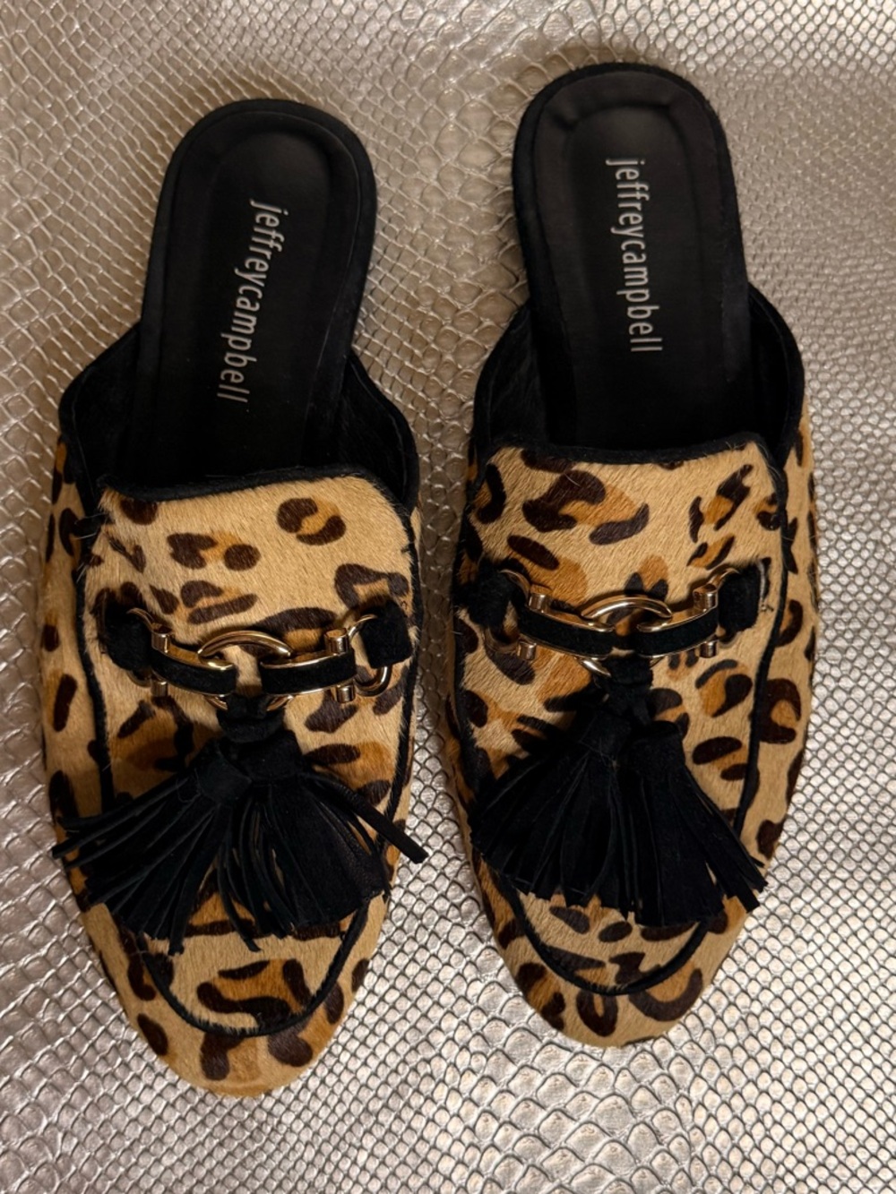 Jeffrey Campbell- hair hide, tassel slides. Size 7. Like new.
